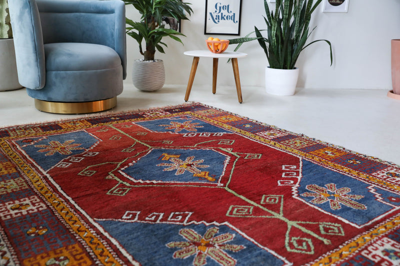 Vintage Turkish rug in a living room setting, Area rug in a living room setting, pile rug, Turkish rug, custom rug, modern rug, portland, rug shop, bright colors, wild shaman, soft rug, bold color, Portland, Oregon, rug store, rug shop, local shop