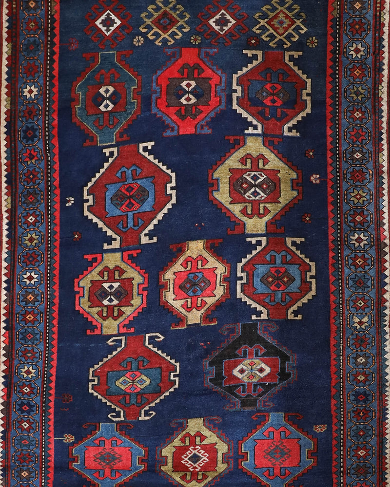 Vintage Turkish rug in a living room setting, Area rug in a living room setting, pile rug, Turkish rug, custom rug, modern rug, portland, rug shop, bright colors, wild shaman, soft rug, bold color, Portland, Oregon, rug store, rug shop, local shop