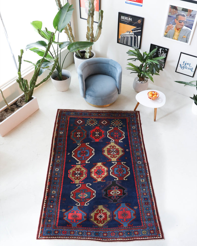 Vintage Turkish rug in a living room setting, Area rug in a living room setting, pile rug, Turkish rug, custom rug, modern rug, portland, rug shop, bright colors, wild shaman, soft rug, bold color, Portland, Oregon, rug store, rug shop, local shop