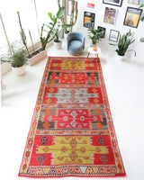 Vintage kilim rug in living room setting, bright colors, wild shaman, soft rug, bold color, Portland, Oregon, rug store, rug shop, local shop, vintage rug, modern kilim, warm colors