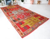 Vintage kilim rug in living room setting, bright colors, wild shaman, soft rug, bold color, Portland, Oregon, rug store, rug shop, local shop, vintage rug, modern kilim, warm colors