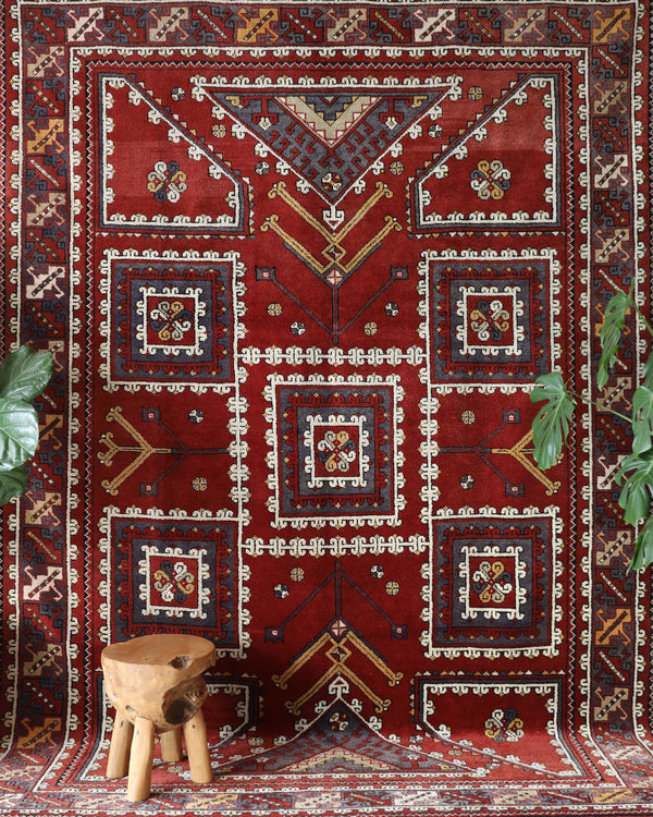 Vintage Turkish rug in a living room setting, pile rug, Turkish rug, vintage rug, portland, rug shop, bright colors, wild shaman, soft rug, bold color, Portland, Oregon, rug store, rug shop, local shop, antique rug