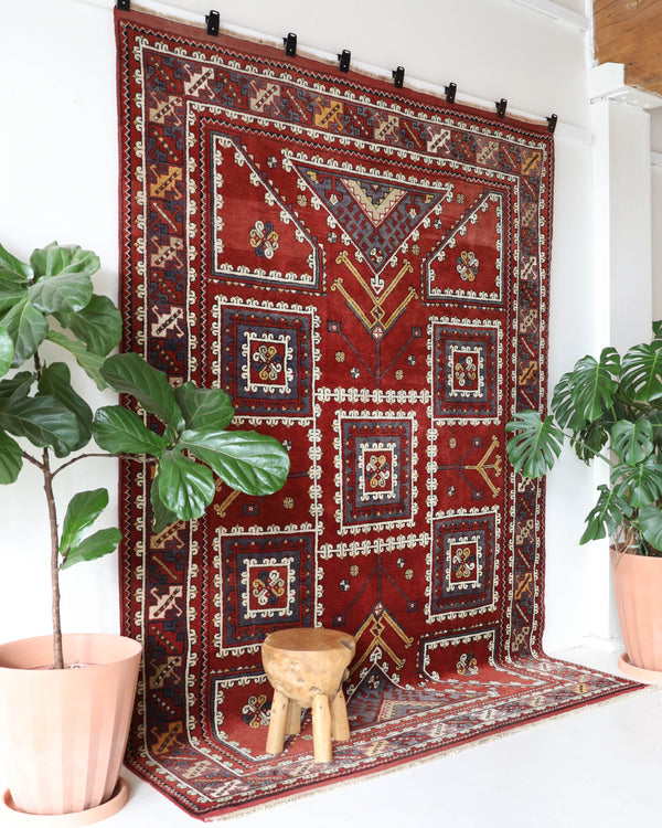 Vintage Turkish rug in a living room setting, pile rug, Turkish rug, vintage rug, portland, rug shop, bright colors, wild shaman, soft rug, bold color, Portland, Oregon, rug store, rug shop, local shop, antique rug