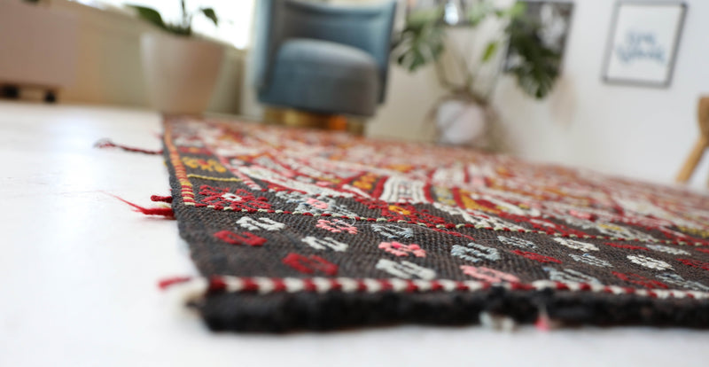 Vintage kilim rug in living room setting, bright colors, wild shaman, soft rug, bold color, Portland, Oregon, rug store, rug shop, local shop, vintage rug, modern kilim, warm colors