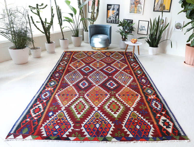 Vintage kilim rug in living room setting, bright colors, wild shaman, soft rug, bold color, Portland, Oregon, rug store, rug shop, local shop, vintage rug, modern kilim, warm colors