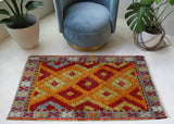 Vintage Turkish rug in a living room setting, pile rug, Turkish rug, vintage rug, portland, rug shop, bright colors, wild shaman, soft rug, bold color, Portland, Oregon, rug store, rug shop, local shop, shag rug, shaggy, plush,tulu rugs