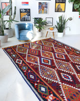 Vintage kilim rug in living room setting, bright colors, wild shaman, soft rug, bold color, Portland, Oregon, rug store, rug shop, local shop, vintage rug, modern kilim, warm colors