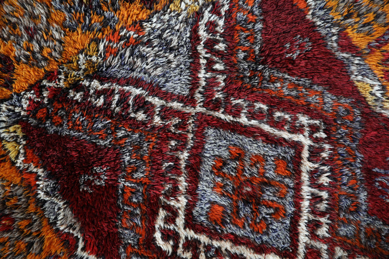 Vintage Turkish rug in a living room setting, pile rug, Turkish rug, vintage rug, portland, rug shop, bright colors, wild shaman, soft rug, bold color, Portland, Oregon, rug store, rug shop, local shop, shag rug, shaggy, plush,tulu rugs