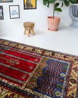 Vintage Turkish rug in a living room setting, pile rug, Turkish rug, vintage rug, portland, rug shop, bright colors, wild shaman, soft rug, bold color, Portland, Oregon, rug store, rug shop, local shopVintage Turkish rug in a living room setting, pile rug, Turkish rug, vintage rug, portland, rug shop, bright colors, wild shaman, soft rug, bold color, Portland, Oregon, rug store, rug shop, local shop