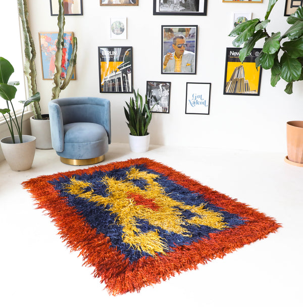  Vintage Turkish rug in a living room setting, pile rug, Turkish rug, vintage rug, portland, rug shop, bright colors, wild shaman, soft rug, bold color, Portland, Oregon, rug store, rug shop, local shop, shag rug, shaggy, plush,tulu rugs