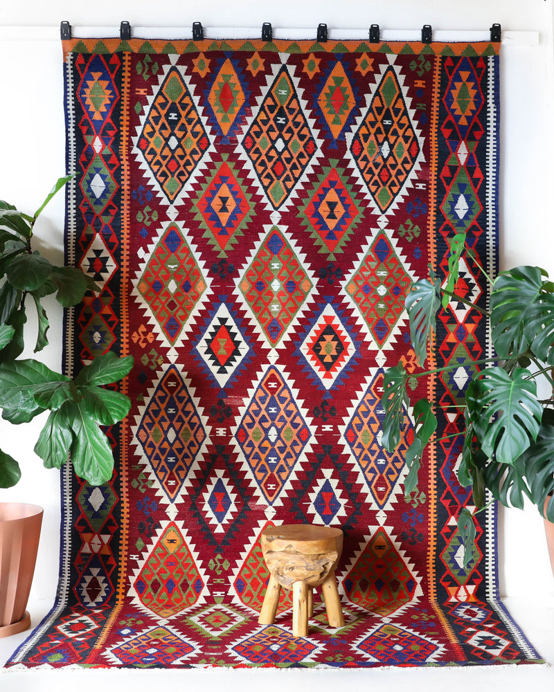 Vintage kilim rug in living room setting, bright colors, wild shaman, soft rug, bold color, Portland, Oregon, rug store, rug shop, local shop, vintage rug, modern kilim, warm colors