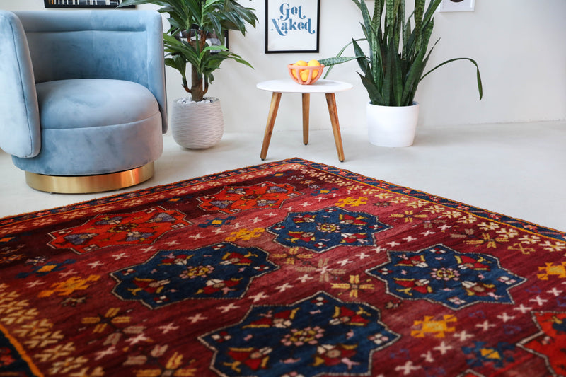 Vintage Turkish rug in a living room setting, Area rug in a living room setting, pile rug, Turkish rug, custom rug, modern rug, portland, rug shop, bright colors, wild shaman, soft rug, bold color, Portland, Oregon, rug store, rug shop, local shop