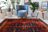 Vintage Turkish rug in a living room setting, Area rug in a living room setting, pile rug, Turkish rug, custom rug, modern rug, portland, rug shop, bright colors, wild shaman, soft rug, bold color, Portland, Oregon, rug store, rug shop, local shop