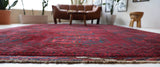 Antique Turkmen rug in a living room setting, pile rug, Turkish rug, vintage rug, portland, rug shop, bright colors, wild shaman, soft rug, bold color, Portland, Oregon, rug store, rug shop, local shop, antique rug