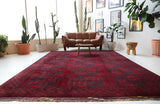 Antique Turkmen rug in a living room setting, pile rug, Turkish rug, vintage rug, portland, rug shop, bright colors, wild shaman, soft rug, bold color, Portland, Oregon, rug store, rug shop, local shop, antique rug