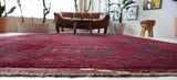 Antique Turkmen rug in a living room setting, pile rug, Turkish rug, vintage rug, portland, rug shop, bright colors, wild shaman, soft rug, bold color, Portland, Oregon, rug store, rug shop, local shop, antique rug