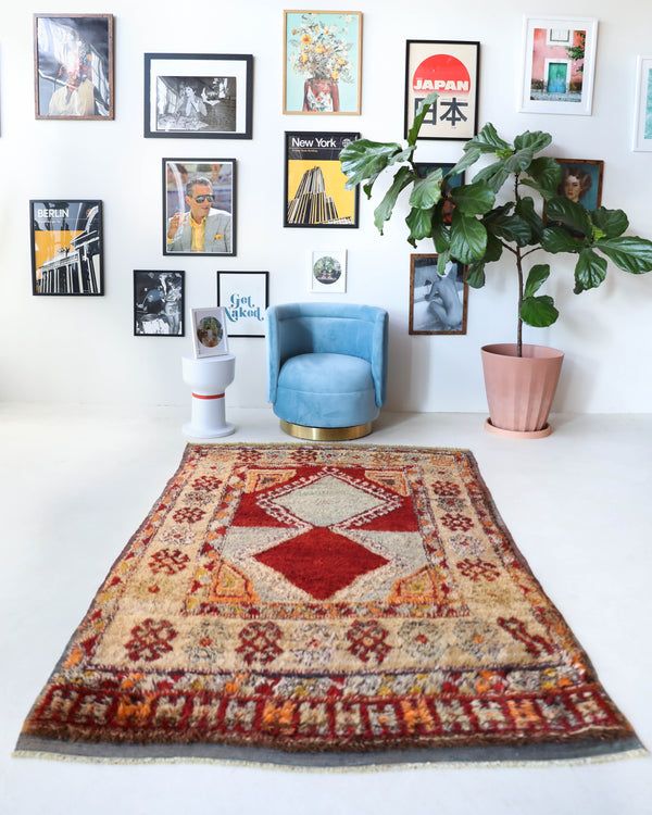 Vintage Turkish rug in a living room setting, pile rug, Turkish rug, vintage rug, portland, rug shop, bright colors, wild shaman, soft rug, bold color, Portland, Oregon, rug store, rug shop, local shop, shag rug, shaggy, plush,tulu rugs