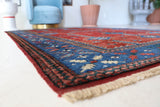 Vintage Turkish rug in a living room setting, pile rug, Turkish rug, vintage rug, portland, rug shop, bright colors, wild shaman, soft rug, bold color, Portland, Oregon, rug store, rug shop, local shop, antique rug