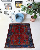 Vintage Turkish rug in a living room setting, pile rug, Turkish rug, vintage rug, portland, rug shop, bright colors, wild shaman, soft rug, bold color, Portland, Oregon, rug store, rug shop, local shop, antique rug