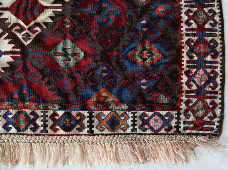  Vintage kilim rug in living room setting, bright colors, wild shaman, soft rug, bold color, Portland, Oregon, rug store, rug shop, local shop, vintage rug, modern kilim, warm colors