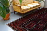 old rug, antique rug, Turkish rug, Portland, Oregon, rug store, rug shop, local shop, bright colors, wild shaman, large rug, area rug, red rug, bold color, baluch rug, burgundy, dark red