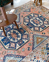 Vintage Turkish rug in living room setting, old rug, antique rug, pastel colors, faded colors, Turkish rug, vintage rug, soft rug, Portland, Oregon, rug store, rug shop, local shop