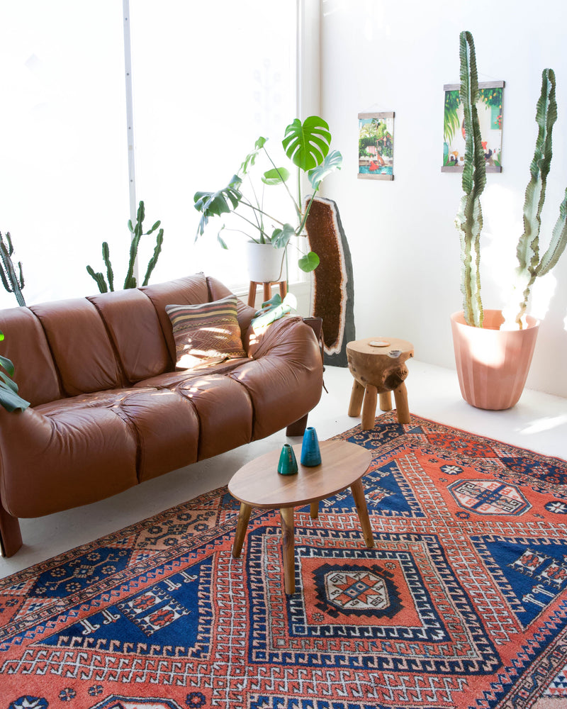 Vintage Turkish rug in living room setting, old rug, antique rug, pastel colors, faded colors, Turkish rug, vintage rug, soft rug, Portland, Oregon, rug store, rug shop, local shop, pastel colors