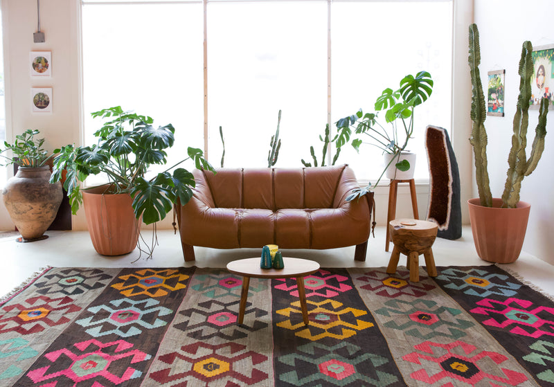 Vintage kilim rug in living room setting, bright colors, wild shaman, soft rug, bold color, Portland, Oregon, rug store, rug shop, local shop, vintage rug, modern kilim, warm colors