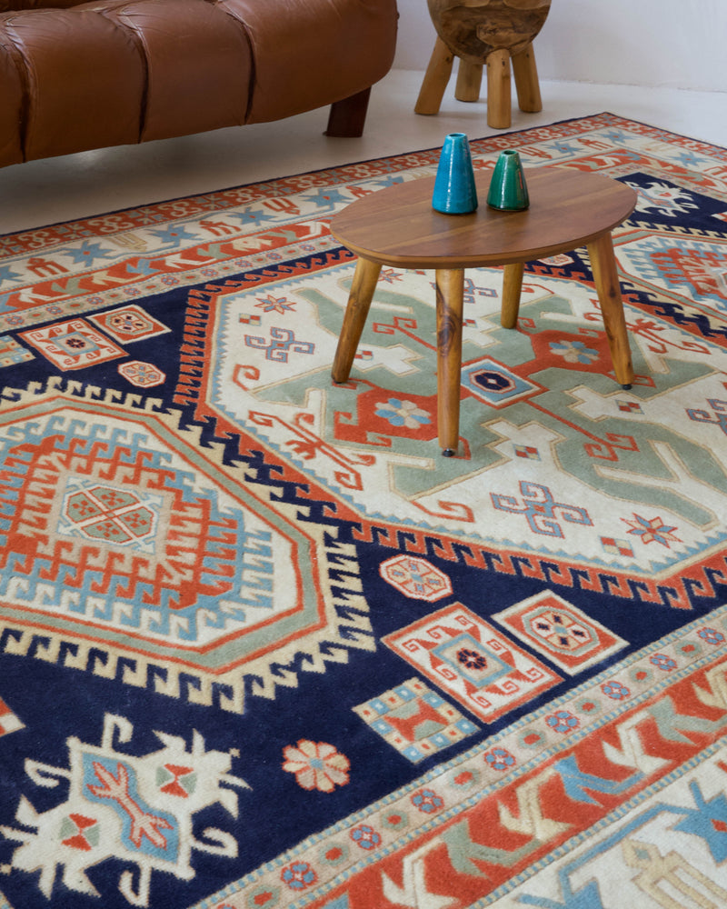 Vintage Turkish rug in a living room setting, pile rug, Turkish rug, vintage rug, portland, rug shop, bright colors, wild shaman, soft rug, bold color, Portland, Oregon, rug store, rug shop, local shop