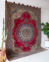 Vintage Turkish rug in a living room setting, pile rug, Turkish rug, vintage rug, portland, rug shop, bright colors, wild shaman, soft rug, bold color, Portland, Oregon, rug store, rug shop, local shop, antique rug,  carpet, ottoman design, floral carpet, traditional carpet, oriental rug