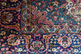 Vintage Turkish rug in a living room setting, pile rug, Turkish rug, vintage rug, portland, rug shop, bright colors, wild shaman, soft rug, bold color, Portland, Oregon, rug store, rug shop, local shop, antique rug,  carpet, ottoman design, floral carpet, traditional carpet, oriental rug