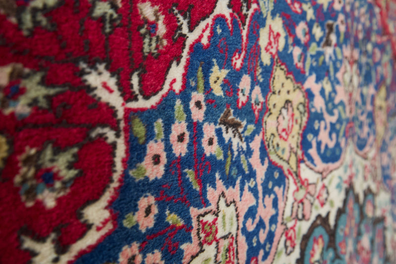 Vintage Turkish rug in a living room setting, pile rug, Turkish rug, vintage rug, portland, rug shop, bright colors, wild shaman, soft rug, bold color, Portland, Oregon, rug store, rug shop, local shop, antique rug,  carpet, ottoman design, floral carpet, traditional carpet, oriental rug