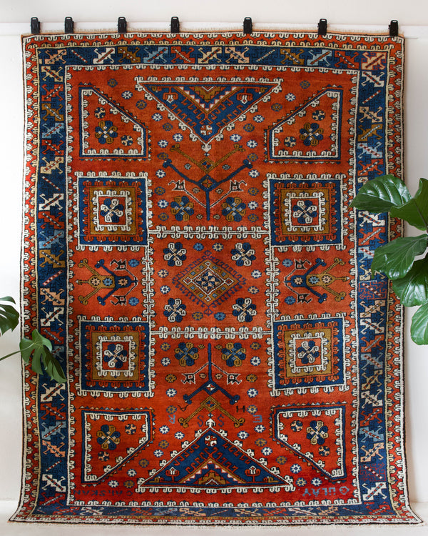 Vintage Turkish rug in a living room setting, pile rug, Turkish rug, vintage rug, portland, rug shop, bright colors, wild shaman, soft rug, bold color, Portland, Oregon, rug store, rug shop, local shop, antique rug