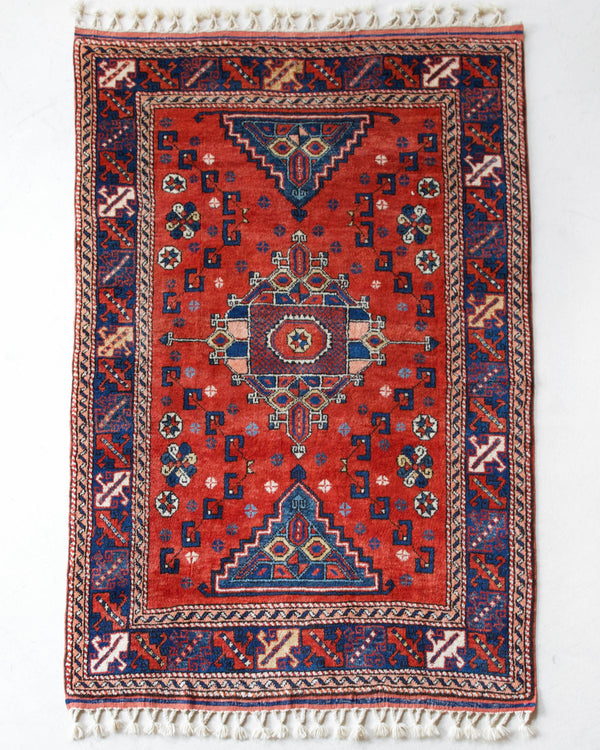 Vintage Turkish rug in a living room setting, pile rug, Turkish rug, vintage rug, portland, rug shop, bright colors, wild shaman, soft rug, bold color, Portland, Oregon, rug store, rug shop, local shop, antique rug