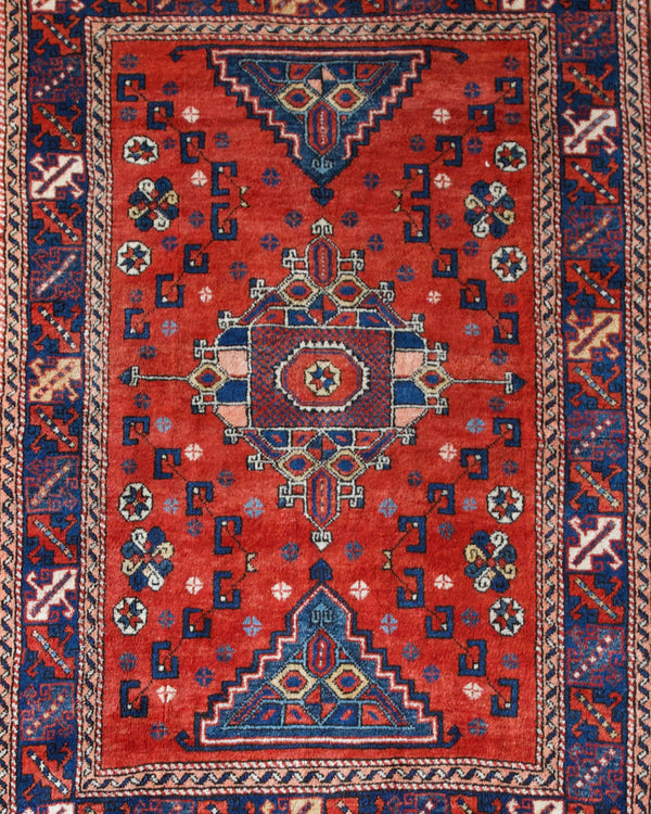 Vintage Turkish rug in a living room setting, pile rug, Turkish rug, vintage rug, portland, rug shop, bright colors, wild shaman, soft rug, bold color, Portland, Oregon, rug store, rug shop, local shop