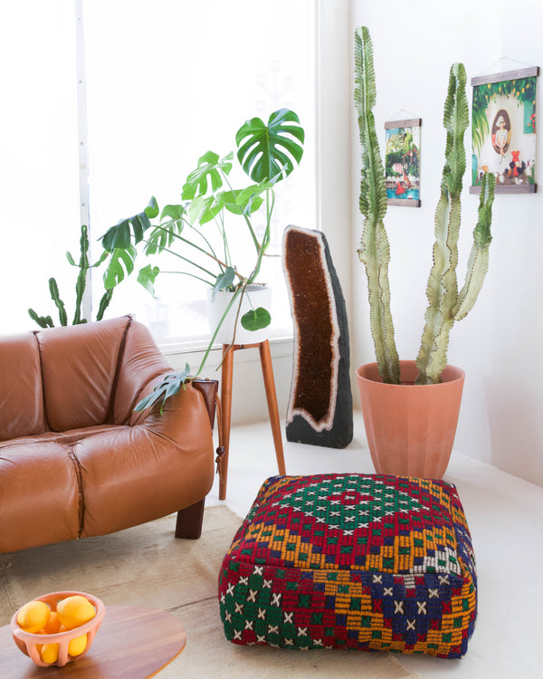 Foor pouf in a living room setting, pillow, turkish pillow, kilim pillow, home decor, decorative pillow, sham, rug pillow, decor, home decor, pouf, floor cushion, cushion, Portland, rugshop, Oregon, Wild Shaman, ottoman