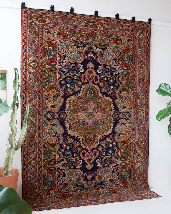 Vintage Turkish rug in a living room setting, pile rug, Turkish rug, vintage rug, portland, rug shop, bright colors, wild shaman, soft rug, bold color, Portland, Oregon, rug store, rug shop, local shop, antique rug