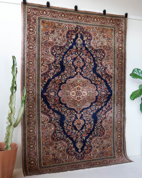 Vintage Turkish rug in a living room setting, pile rug, Turkish rug, vintage rug, portland, rug shop, bright colors, wild shaman, soft rug, bold color, Portland, Oregon, rug store, rug shop, local shop, antique rug