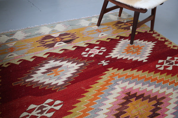 orange, green, bright color, antique, oushak rug, portland rug shop, rug store, wild shaman