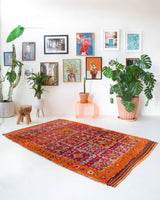 Vintage Turkish rug in a living room setting, pile rug, Turkish rug, vintage rug, portland, rug shop, bright colors, wild shaman, soft rug, bold color, Portland, Oregon, rug store, rug shop, local shop, antique rug