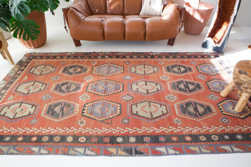 old rug, antique rug, earthy colors, faded colors, Turkish rug, vintage rug, flat weave, kilim rug, large area rug, square rug, Wild Shaman, Portland, Oregon, rug store, rug shop, local shop