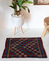 Vintage mini kilim rug in room decor setting, kilim, Turkish rug, vintage rug, portland, rug shop, bright colors, wild shaman, soft rug, bold color, Portland, Oregon, rug store, rug shop, local shop