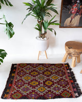 Vintage mini kilim rug in room decor setting, kilim, Turkish rug, vintage rug, portland, rug shop, bright colors, wild shaman, soft rug, bold color, Portland, Oregon, rug store, rug shop, local shop