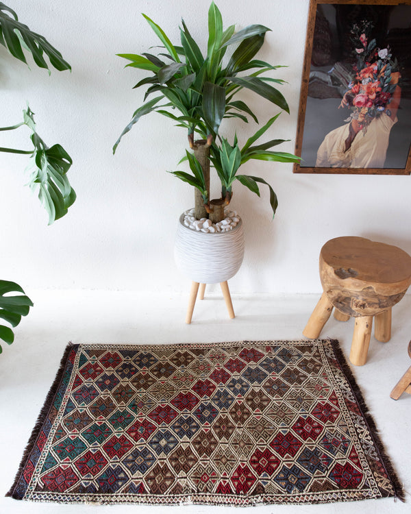 Vintage mini kilim rug in room decor setting, kilim, Turkish rug, vintage rug, portland, rug shop, bright colors, wild shaman, soft rug, bold color, Portland, Oregon, rug store, rug shop, local shop