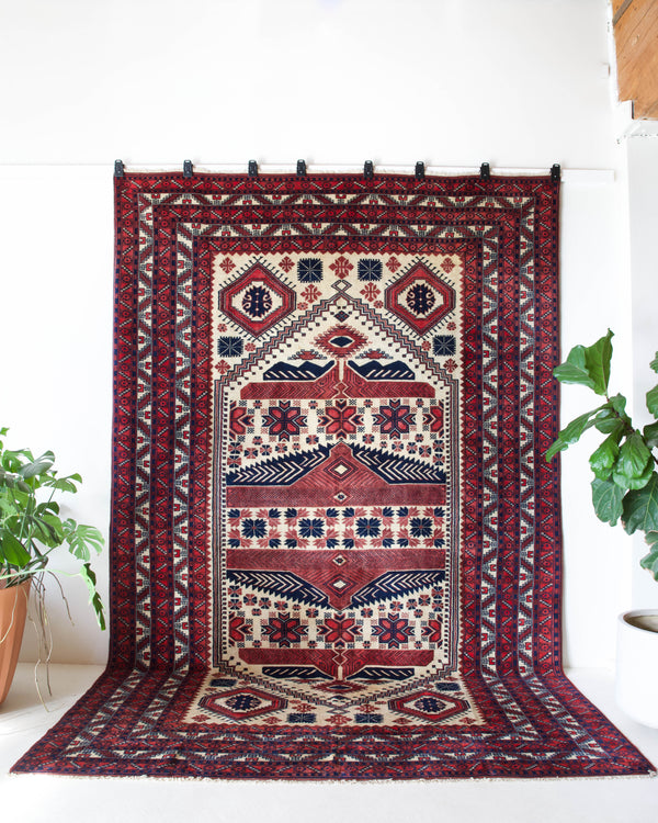 Vintage Turkish rug in a living room setting, pile rug, Turkish rug, vintage rug, portland, rug shop, bright colors, wild shaman, soft rug, bold color, Portland, Oregon, rug store, rug shop, local shop, antique rug