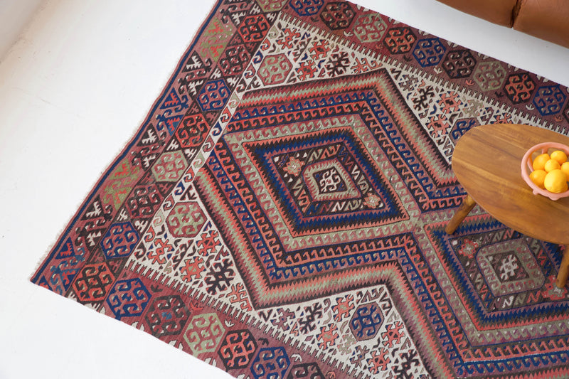 old rug, antique rug, earthy colors, faded colors, Turkish rug, vintage rug, worn out rug, distressed rug, Portland, Oregon, rug store, rug shop, local shop, pile rug