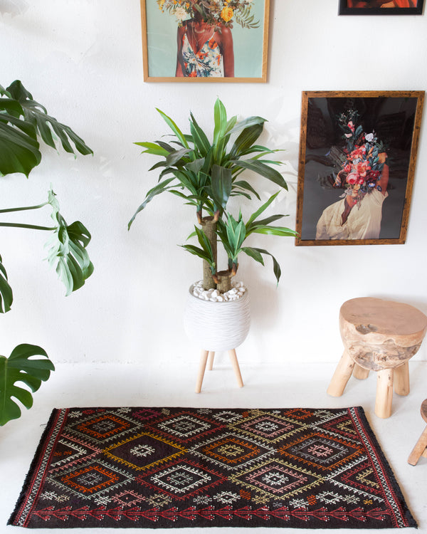 Vintage mini kilim rug in room decor setting, kilim, Turkish rug, vintage rug, portland, rug shop, bright colors, wild shaman, soft rug, bold color, Portland, Oregon, rug store, rug shop, local shop