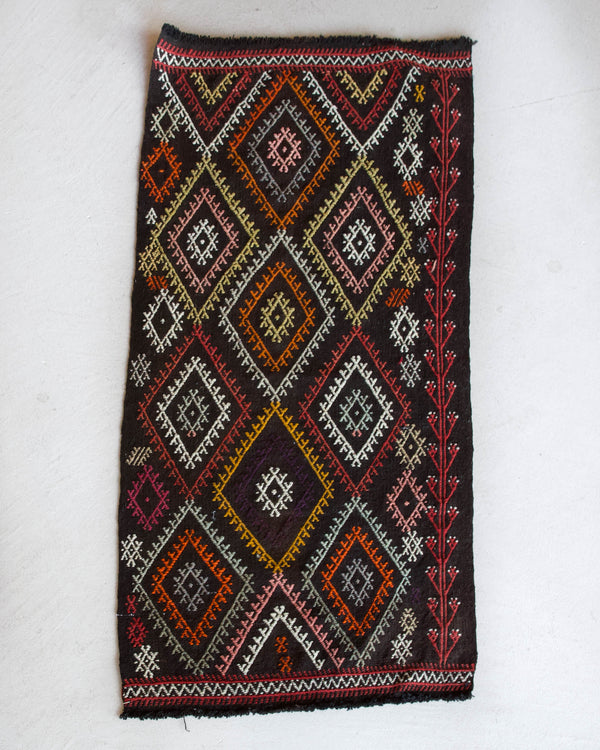 Vintage mini kilim rug in room decor setting, kilim, Turkish rug, vintage rug, portland, rug shop, bright colors, wild shaman, soft rug, bold color, Portland, Oregon, rug store, rug shop, local shop