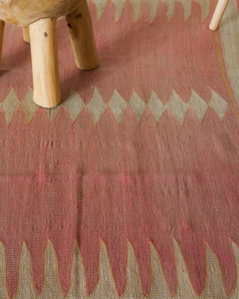 Vintage kilim rug in living room setting, old rug, antique rug, pastel colors, faded colors, Turkish rug, vintage rug, soft rug, Portland, Oregon, rug store, rug shop, local shop, earthy tones, earthy colors, warm colors