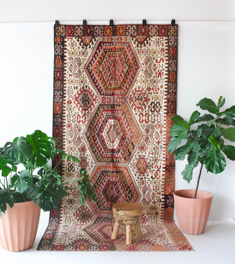 old rug, antique rug, earthy colors, faded colors, Turkish rug, vintage rug, flat weave, kilim rug, large area rug, square rug, Wild Shaman, Portland, Oregon, rug store, rug shop, local shop